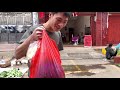 new year is approaching a huan catches chickens and ducks to entertain the brothers