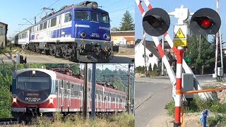 Two trains at old railroad crossings in Mosina, Poland.