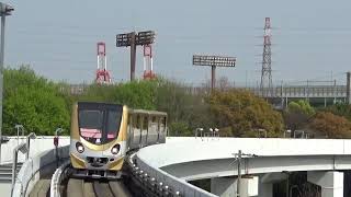 【大阪メトロ誕生記念】ニュートラム200系第14編成(ゴールド)1番試乗会列車　ポートタウン東駅到着