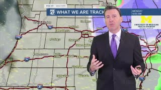 Rain and possibly snow moves out late tonight