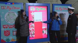 Donation total check-in at Toys for Tots