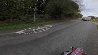 Van Pulls Out and Nearly Hits Biker on Country Road