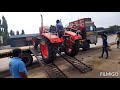 5 New MU4501 Kubota Tractor Unloading To Container By Kubota Dealership