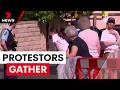 Protesters gather outside church set for royal visit | 7NEWS