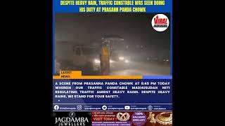 Despite heavy rain, Traffic Constable was seen doing his duty at Prasann Panda Chowk, JHARSUGUDA