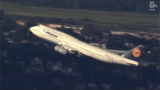 Helicopter captures iconic Boeing 747 departing from Boston's Logan Airport