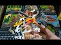 unboxing toy animals cows ducks geese buffalo rhinos tigers lions wild animals