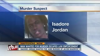 Search continues for murder suspect - 2