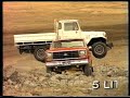 ford f350 carrying a toyota landcruiser uphill tv commercial