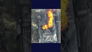 Russian tank catches fire after Ukrainian drone drops grenade on it