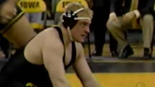 Freshman Steve Mocco footsweeps All-American Brink. Iowa Wrestling v Michigan NCAA dual 2002 - 285