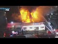 Large fire erupts at commercial building in Van Nuys