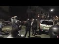 police retreat as protesters hurl objects at them in philadelphia