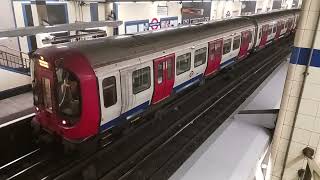 trains at Aldgate East plus not in service train