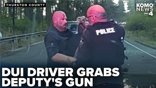 Thurston County deputy fights with DUI suspect who grabbed her gun at crash scene