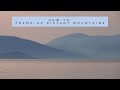 Frame-up distant mountains in a balanced, pleasing composition