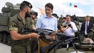 Trudeau extends Latvia mission while Trump blasts NATO spending