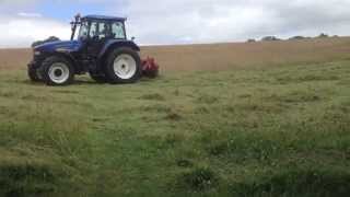 New Holland TM120 Mowing Hay