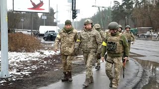 Ukrainian soldiers set up checkpoints in Hostomel, west of Kyiv | AFP