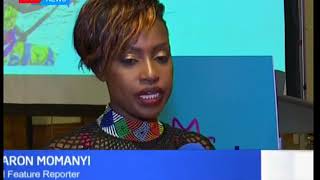 KTN 's Senior Features reporter Sharon Momanyi receives a special recognition