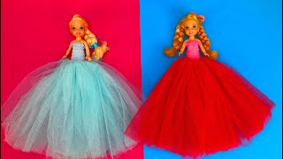 Elsa and Anna toddlers surprise clothes in a box