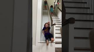 Cool mom builds an indoor slide for daughters