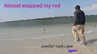 Fishing in another rocky spot in windy conditions