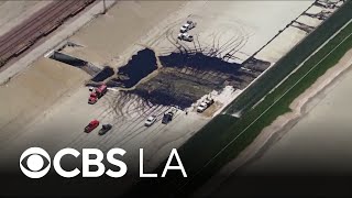 Ruptured East LA oil pipeline leaks thousands of gallons of petroleum into LA River and streets