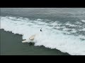 three surfers collide while riding same wave