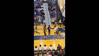 St. John High School star Daquan Davis with the running floater shot