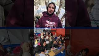 Volunteer teachers provide education to displaced children in a tent school in central Gaza Strip