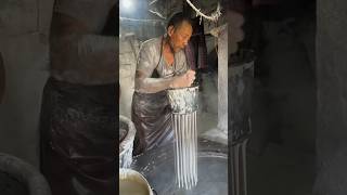 Traditional process of making rice noodles