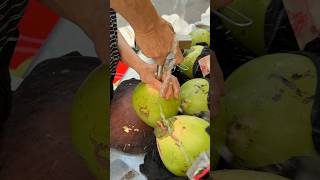 Fresh coconut water bursting with juice! - Fruit Cutting Skills!