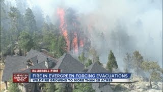 Evacuations lifted for most residents as wildfire 'lays down'