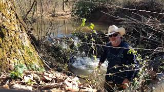 Removing a Beaver Dam by Hand