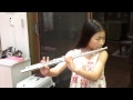 Jane Suh is practicing flute