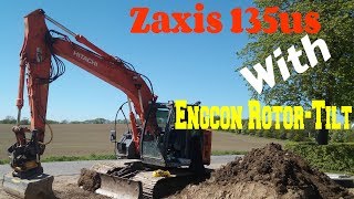 Grading Top soil out = Hitachi zaxis 135us \