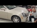 cadillac cts headlight replacement