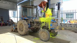 Cleaning a cute little tractor with a very strong press, satisfying the viewer