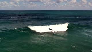 Jake showing us how to wing foil in the surf.