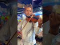 Menino do violino no Morto da Conceição do Recife.