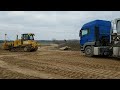 cat d6k2 pushing sand