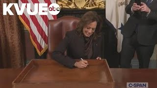 Vice President Harris signs desk drawer