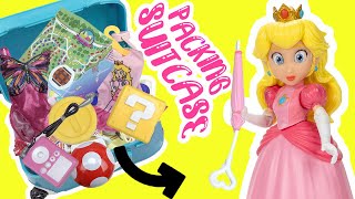 The Super Mario Bros Movie Princess Peach Doll Packs Suitcase for Vacation