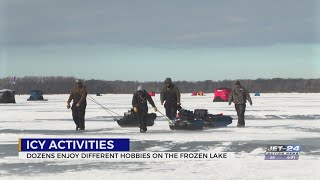 Erie residents enjoy frozen winter fun on icy Presque Isle Bay