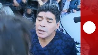 Video: Diego Maradona slaps reporter for 'winking' at ex-wife