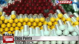 Taiwanese company does brisk business selling face and body paint sticks to World Cup fans