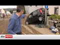 WATCH: Sky correspondent walks through German street devastated by floods