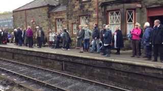 People on Platform Groathland Station North Yorkshire Moors Railway. Pickering Wartime Weekend 2013.