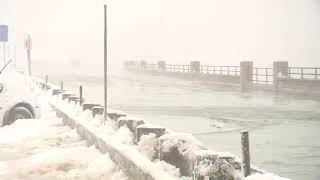 Seawater crashes over wall at Hampton's North Beach